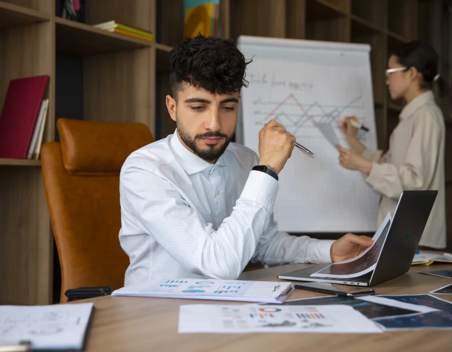 office-workers-using-finance-graphs