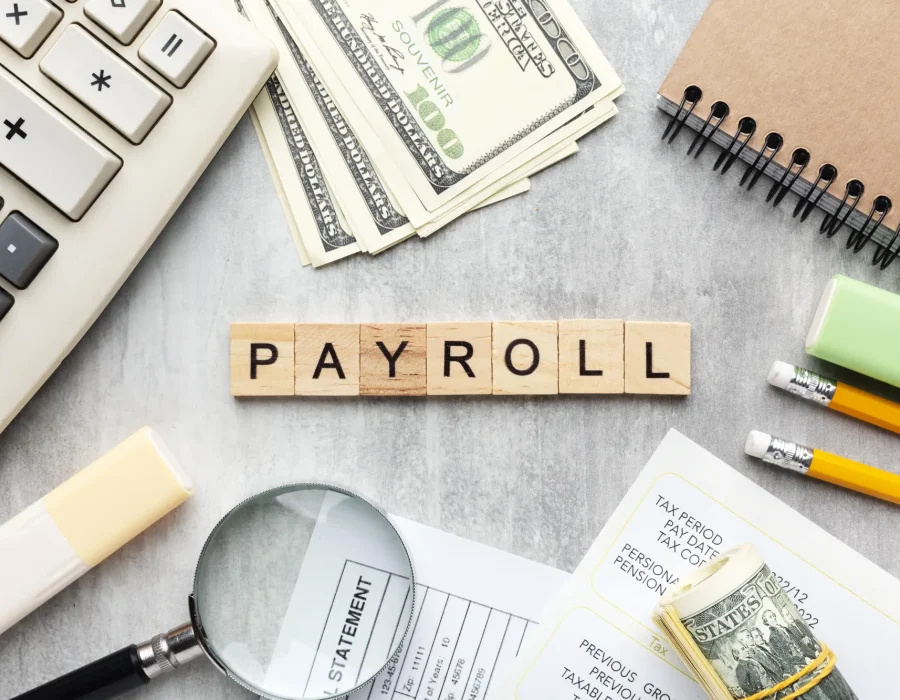 top-view-payroll-concept-with-items